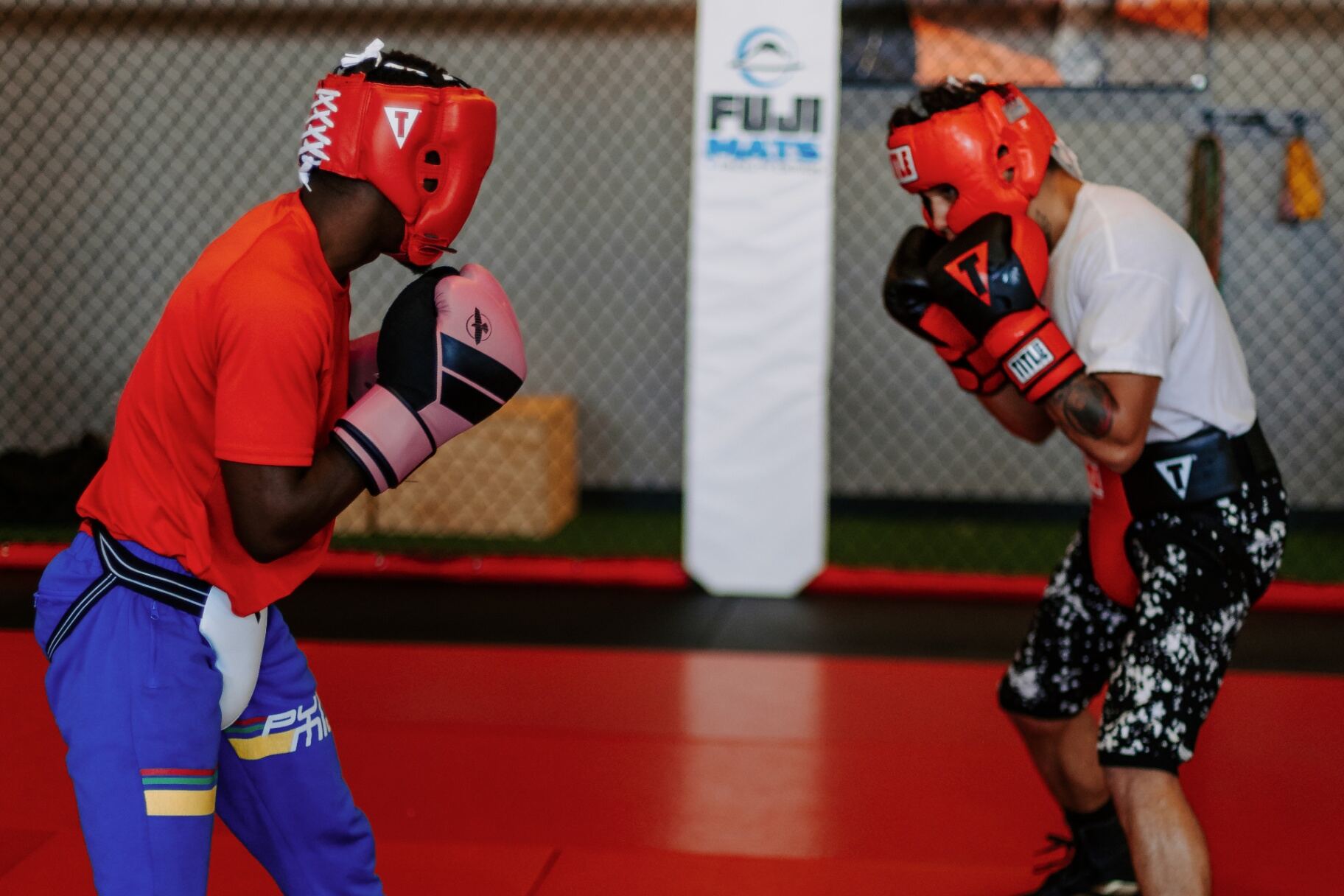 Beginner boxing students working focus mitts at Next Edge Academy